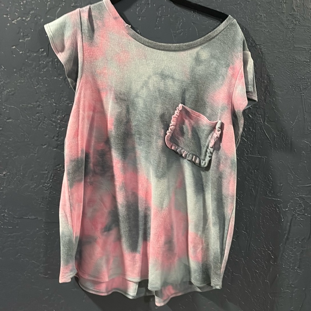 Super cute tye dye shirt with pocket on front. Sweatshirt type material.